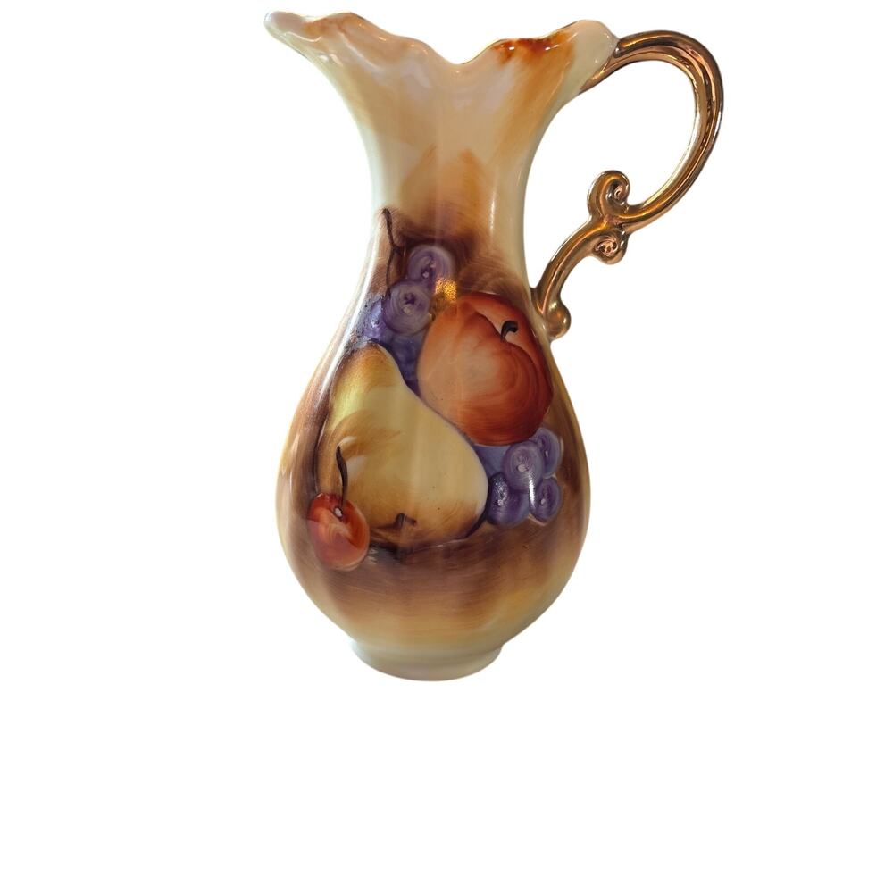 This vintage ceramic pitcher